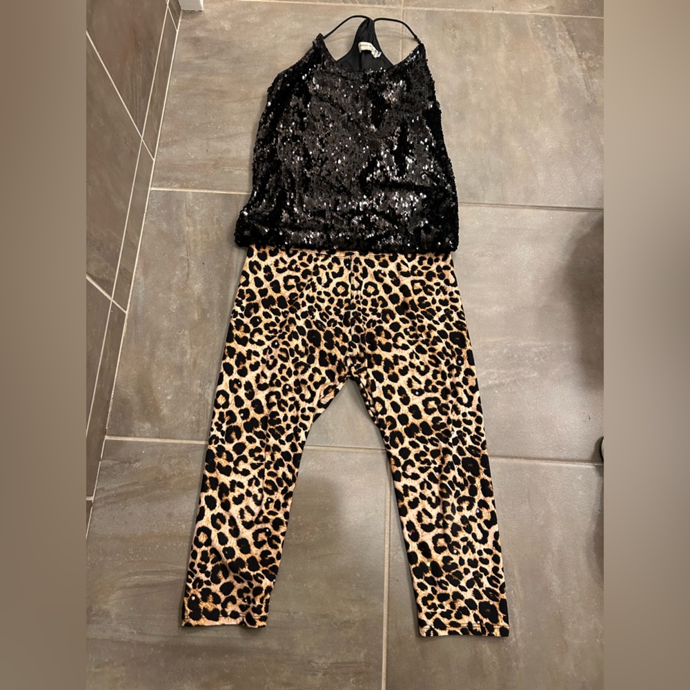 2 piece outfit. My daughter wore it as a dance costume so it is rhinestoned.